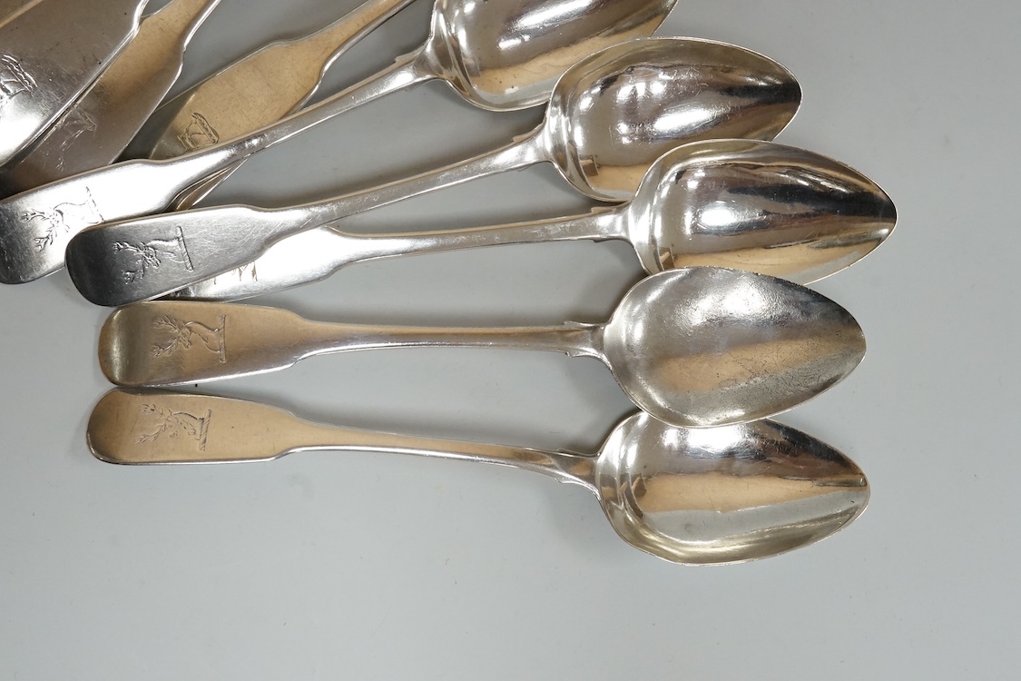 A set of six late George III Irish silver fiddle pattern table spoons and six matching dessert spoons, Philip Weekes, Dublin, 1818, 20.6oz.